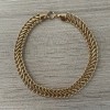 Pulseira de Ouro 18K Grumê Paralela 7mm largura 19cm comprimento  aproximadamente 5.5gr código 37487-07x19