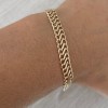 Pulseira de Ouro 18K Grumê Paralela 7mm largura 19cm comprimento  aproximadamente 5.5gr código 37487-07x19